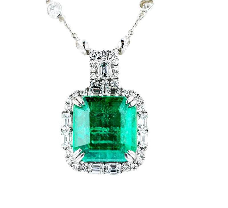 Ladies solid form necklaces -JULEVE 18KT WHITE GOLD 12 CT EMERALD & 2.35 CTW DIAMOND HALO NECKLACE