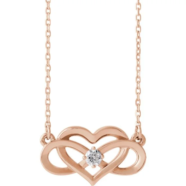 Ladies ocean swirl necklaces -1/10 CTW DIAMOND INFINITY-INSPIRED HEART NECKLACE