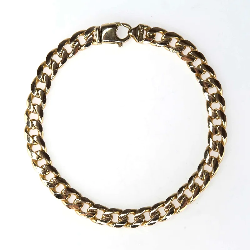 Ladies tropic bloom bracelets -7mm Wide Curb Link 8.5" Bracelet in 14K Yellow Gold - 27.4 grams