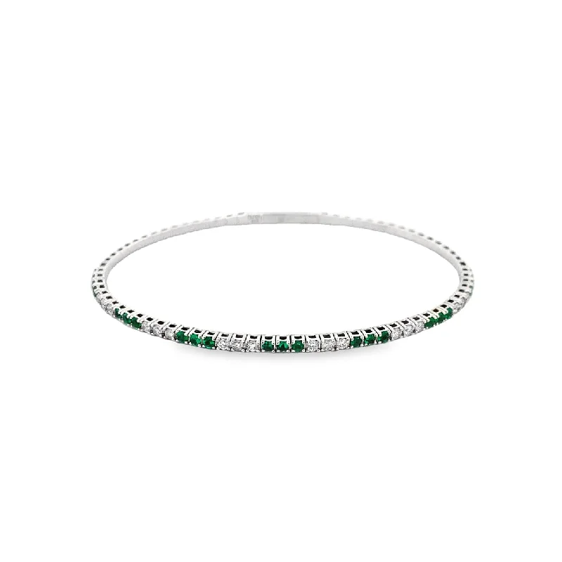 Ladies daring glow bracelets -Emerald and Diamond Bangle in White Gold