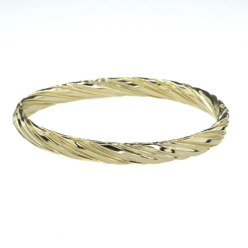 Ladies family glow bracelets -6.6mm Wide Hinge Twist Bangle Bracelet in 14K Yellow Gold