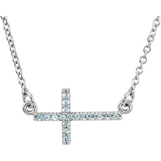 Ladies astrology charm necklaces -14KT GOLD 0.17 CTW ROUND AQUAMARINE SIDEWAYS CROSS NECKLACE