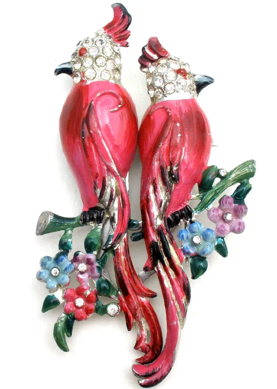 Ladies glistening silver brooches -Coro Calopsitta Pink Bird Duette Brooch Set c. 1941