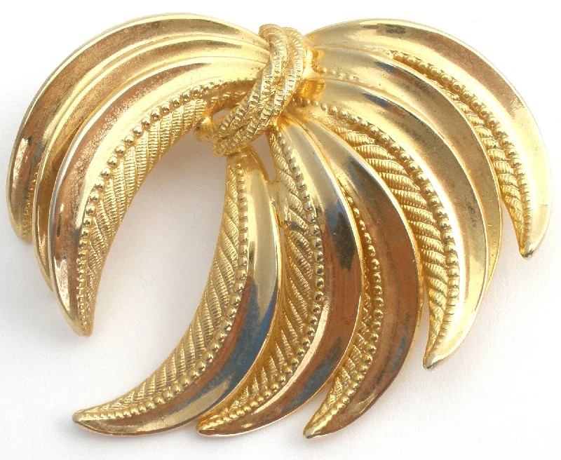 Ladies warm gleam brooches -Kramer Gold Tone Brooch Pin  Vintage