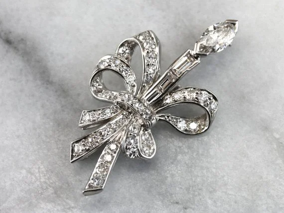 Ladies snowy white brooches -Sweeping Retro Era Platinum and Diamond Brooch