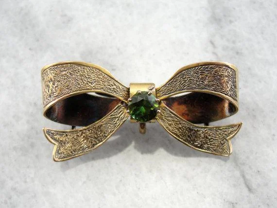 Ladies luxurious gleam brooches -Sweet Antique Bow Brooch with Green Tourmaline