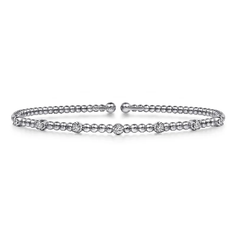 Ladies perfect balance bracelets -Seven Station Diamond Bujukan Bangle in White Gold by Gabriel NY