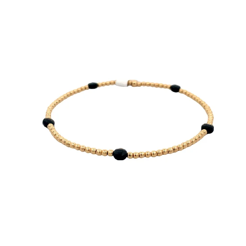 Ladies painted flair bracelets -2mm Stretch Beaded Bracelet with Spinel Disc Pattern in Yellow Gold by Karen Lazar