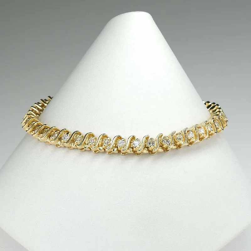 Ladies high sheen bracelets -14K Yellow Gold 2.20ctw Round Diamond Accented 7.5" "S" Link Tennis Bracelet